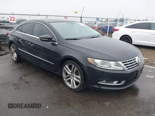 2013 Volkswagen CC Lux with VIN WVWRP7AN7DE510490, listed as a IAAI auction lot 41457328 with 154,443 mi miles. Bid and sale history available at carsss.com. Image 1.