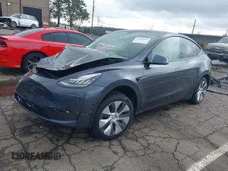 2022 Tesla Model Y Long Range with VIN 7SAYGDEE8NF317482, listed as a IAAI auction lot 41806043 with 32,108 mi miles and . Bid and sale history available at carsss.com. Image 2.