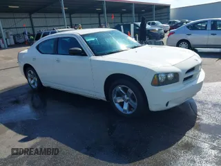 2009 Dodge Charger SE with VIN 2B3KA43V59H523089, listed as a IAAI auction lot 42002447 with 265,731 mi miles. Bid and sale history available at carsss.com. Image 1.