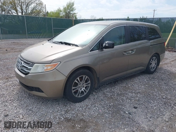 2013 Honda Odyssey EX-L with VIN 5FNRL5H65DB064238, listed as a IAAI auction lot 42050743 with 189,437 mi miles and . Bid and sale history available at carsss.com. Image 2.