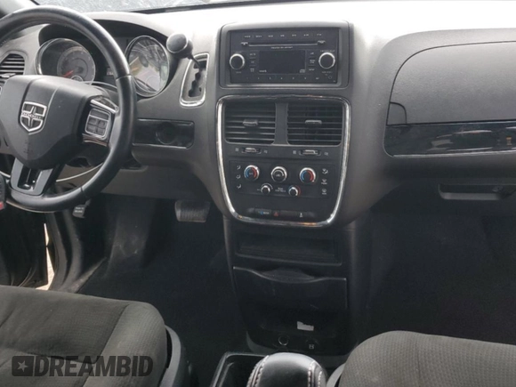 2015 Dodge Grand Caravan American Value with VIN 2C4RDGBG6FR659777, listed as a Copart auction lot 53847385 with 176,802 mi miles and Salvage Title. Bid and sale history available at DreamBid. Image 8.