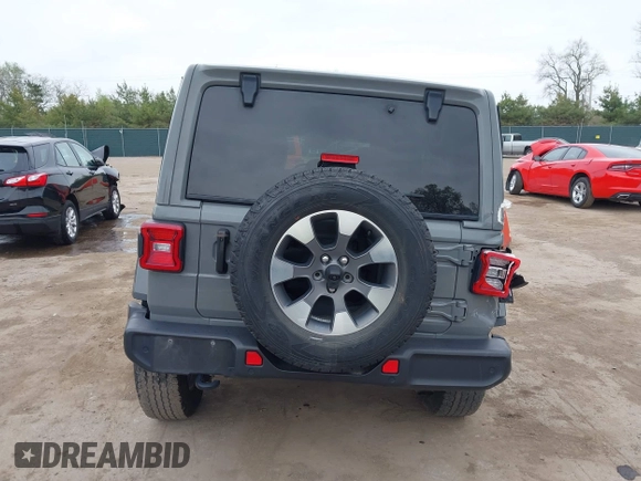 2022 Jeep Wrangler Unlimited Sahara with VIN 1C4HJXEG7NW138105, listed as a IAAI auction lot 42146898 with Not provided miles and . Bid and sale history available at DreamBid. Image 17.