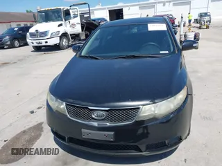 2010 Kia Forte EX with VIN KNAFU4A20A5847351, listed as a IAAI auction lot 41897921 with 129,084 mi miles. Bid and sale history available at carsss.com. Image 12.