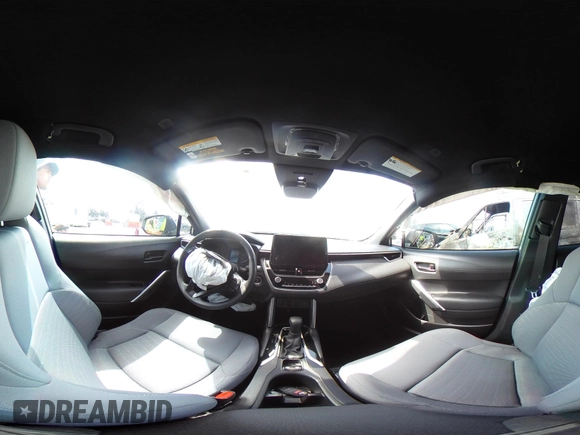 2023 Toyota Corolla Cross Hybrid S with VIN 7MUFBABG1PV014992, listed as a IAAI auction lot 42202656 with 18,913 mi miles and . Bid and sale history available at DreamBid. Image 18.