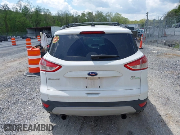 2013 Ford Escape SE with VIN 1FMCU0G90DUB37052, listed as a IAAI auction lot 42132973 with 169,975 mi miles and . Bid and sale history available at DreamBid. Image 16.