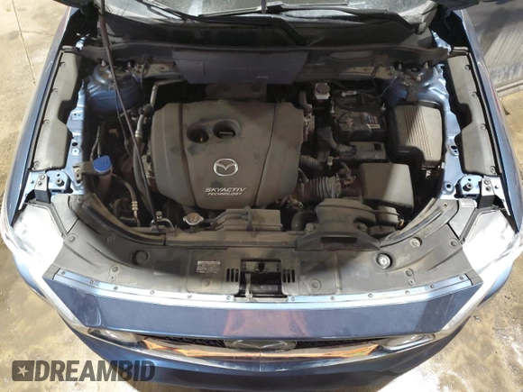 2018 Mazda CX-5 Grand Touring with VIN JM3KFBDM9J0411504, listed as a Copart auction lot 42050825 with 125,695 mi miles and Salvage Title. Bid and sale history available at carsss.com. Image 12.