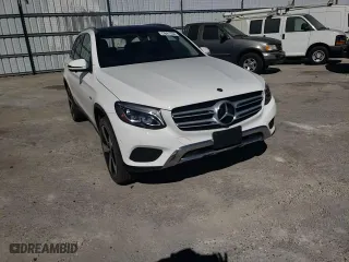 2019 Mercedes-Benz GLC with VIN WDC0G5EB0KF627620, listed as a Copart auction lot 77641154 with 73,741 mi miles and Salvage Title. Bid and sale history available at carsss.com. Image 12.