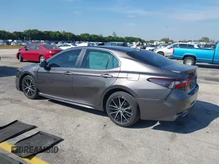 2023 Toyota Camry SE with VIN 4T1G11AK1PU809099, listed as a IAAI auction lot 41450292 with 128,099 mi miles. Bid and sale history available at carsss.com. Image 3.