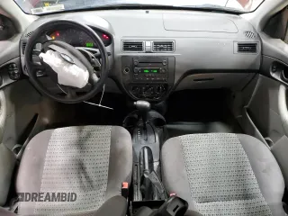 2006 Ford Focus S z VIN 1FAFP34N76W153239, wystawiony jako Copart lot #53085555 z przebiegiem 118 259 mil mil oraz Szkody całkowita. Historia ofert i sprzedaży dostępna na DreamBid. Obrazek 8.