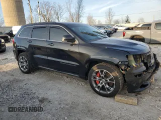 2012 Jeep Grand Cherokee SRT8 with VIN 1C4RJFDJ2CC265421, listed as a Copart auction lot 48654325 with 115,514 mi miles and Salvage Title. Bid and sale history available at carsss.com. Image 4.