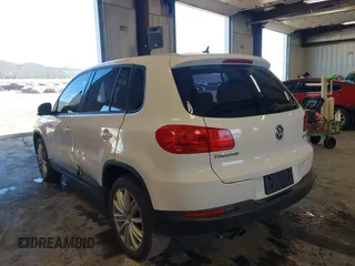 2013 Volkswagen Tiguan with VIN WVGCV3AX7DW605594, listed as a IAAI auction lot 42057457 with 131,629 mi miles and . Bid and sale history available at DreamBid. Image 3.