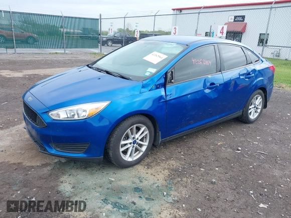2018 Ford Focus SE z VIN 1FADP3F29JL235302, wystawiony jako IAAI lot #42262964 z przebiegiem 85 127 mil mil oraz . Historia ofert i sprzedaży dostępna na DreamBid. Obrazek 17.
