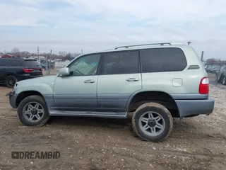 2004 Lexus LX 470 z VIN JTJHT00W143546192, wystawiony jako IAAI lot #41673810 z przebiegiem 232 196 mil mil oraz . Historia ofert i sprzedaży dostępna na DreamBid. Obrazek 14.