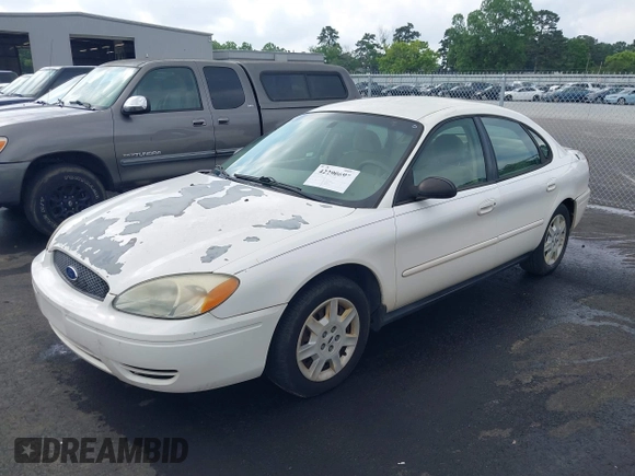 2007 Ford Taurus SE with VIN 1FAFP53U07A115368, listed as a IAAI auction lot 42290697 with 206,884 mi miles and . Bid and sale history available at DreamBid. Image 2.