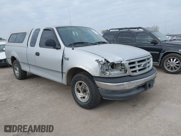 1999 Ford F-150 with VIN 1FTZX1720XKA10512, listed as a IAAI auction lot 41247083 with 169,154 mi miles and . Bid and sale history available at DreamBid. Image 1.