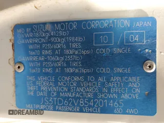 2005 Suzuki Grand Vitara LX z VIN JS3TD62V854201465, wystawiony jako Copart lot #61460344 z przebiegiem 204 784 mil mil oraz Szkoda całkowita • Salvage title. Historia ofert i sprzedaży dostępna na DreamBid. Obrazek 14.
