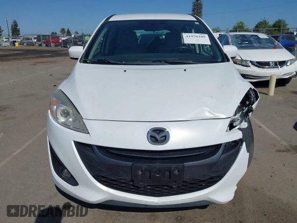 2012 Mazda 5 Touring with VIN JM1CW2CL7C0140452, listed as a IAAI auction lot 41970209 with 92,069 mi miles and . Bid and sale history available at DreamBid. Image 13.