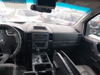 2011 Nissan Titan Pro-4X with VIN 1N6BA0EC3BN320795, listed as a IAAI auction lot 41868113 with 183,919 mi miles and . Bid and sale history available at DreamBid. Image 17.