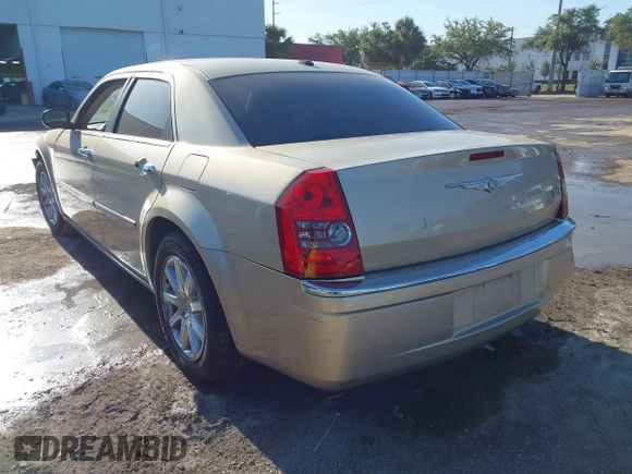 2009 Chrysler 300 Limited with VIN 2C3KA33V99H592963, listed as a IAAI auction lot 42041417 with 160,829 mi miles. Bid and sale history available at carsss.com. Image 3.