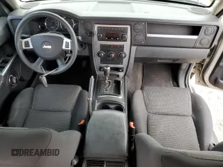 2009 Jeep Commander Sport z VIN 1J8HH48K79C519351, wystawiony jako Copart lot #44996585 z przebiegiem 153 891 mil mil oraz Czysty tytuł • Clean title. Historia ofert i sprzedaży dostępna na DreamBid. Obrazek 8.