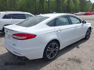 2019 Ford Fusion Titanium with VIN 3FA6P0D91KR140260, listed as a IAAI auction lot 41931629 with 95,207 mi miles. Bid and sale history available at carsss.com. Image 4.