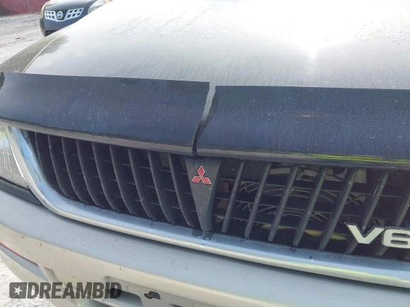 1999 Mitsubishi Montero Sport LS with VIN JA4MT31HXXP024168, listed as a IAAI auction lot 42064951 with 123,539 mi miles. Bid and sale history available at carsss.com. Image 6.