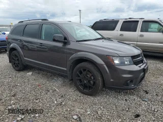 2017 Dodge Journey SXT z VIN 3C4PDCBG3HT516401, wystawiony jako Copart lot #56498445 z przebiegiem 65 156 mil mil oraz Szkoda całkowita • Salvage title. Historia ofert i sprzedaży dostępna na DreamBid. Obrazek 4.