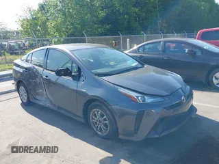 2022 Toyota Prius L Eco z VIN JTDKAMFU5N3188480, wystawiony jako IAAI lot #42146176 z przebiegiem 35 554 mil mil oraz . Historia ofert i sprzedaży dostępna na DreamBid. Obrazek 1.