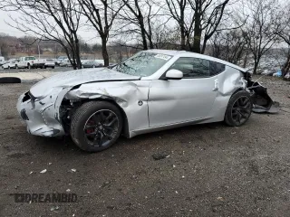 2016 Nissan 370Z z VIN JN1AZ4EH0GM937341, wystawiony jako Copart lot #85097494 z przebiegiem 105 665 mil mil oraz Szkoda całkowita • Salvage title. Historia ofert i sprzedaży dostępna na DreamBid. Obrazek 1.