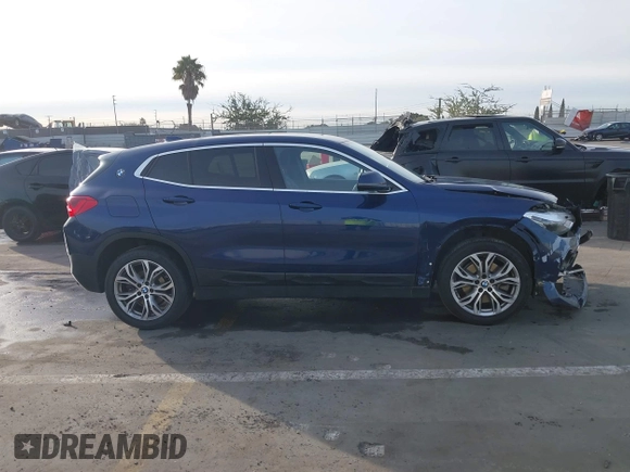 2020 BMW X2 sDrive28i with VIN WBXYH9C02L5P01502, listed as a IAAI auction lot 41397416 with 82,660 mi miles. Bid and sale history available at carsss.com. Image 13.