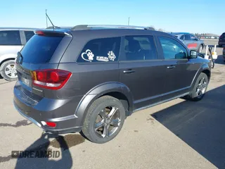 2016 Dodge Journey Crossroad Plus z VIN 3C4PDDGGXGT135934, wystawiony jako IAAI lot #41976026 z przebiegiem 141 181 mil mil oraz . Historia ofert i sprzedaży dostępna na DreamBid. Obrazek 4.
