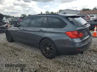 2014 BMW 3 Series 328d xDrive with VIN WBA3K5C59EKT33205, listed as a Copart auction lot 65216574 with 202,927 mi miles and Salvage title. Bid and sale history available at DreamBid. Image 2.