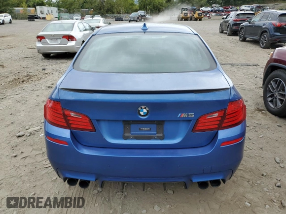 2014 BMW M5 z VIN WBSFV9C5XED097563, wystawiony jako Copart lot #72175354 z przebiegiem 73 406 mil mil oraz Szkody całkowita. Historia ofert i sprzedaży dostępna na DreamBid. Obrazek 6.
