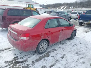 2009 Toyota Yaris with VIN JTDBT903991314767, listed as a IAAI auction lot 41615264 with 252,957 mi miles. Bid and sale history available at carsss.com. Image 4.
