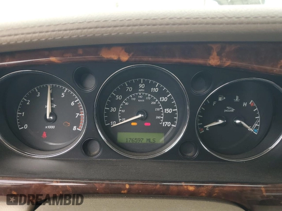 2004 Jaguar XJ Vanden Plas with VIN SAJWA74C04SG25291, listed as a Copart auction lot 56678255 with 176,597 mi miles and Clean Title. Bid and sale history available at DreamBid. Image 9.