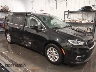 2022 Chrysler Pacifica Touring L with VIN 2C4RC1BG0NR170029, listed as a IAAI auction lot 41890660 with 88,121 mi miles and . Bid and sale history available at DreamBid. Image 6.