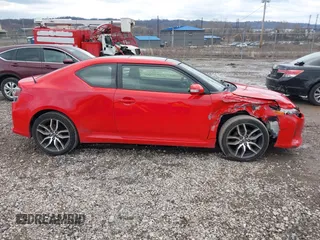 2014 Scion tC z VIN JTKJF5C76E3078810, wystawiony jako IAAI lot #41638613 z przebiegiem 76 648 mil mil oraz . Historia ofert i sprzedaży dostępna na DreamBid. Obrazek 14.