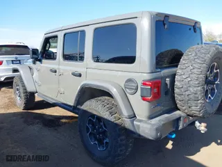 2022 Jeep Wrangler 4xe Unlimited Rubicon with VIN 1C4JJXR61NW160832, listed as a IAAI auction lot 39421092 with 32,347 mi miles. Bid and sale history available at carsss.com. Image 14.