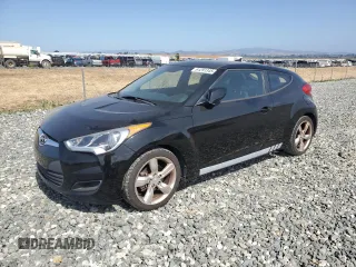 2015 Hyundai Veloster z VIN KMHTC6AD8FU228009, wystawiony jako Copart lot #61291345 z przebiegiem 203 831 mil mil oraz Czysty tytuł • Clean title. Historia ofert i sprzedaży dostępna na DreamBid. Obrazek 1.