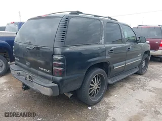2003 Chevrolet Tahoe LT with VIN 1GNEC13Z13J297511, listed as a IAAI auction lot 41902595 with 293,195 mi miles. Bid and sale history available at carsss.com. Image 4.