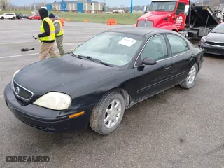 2003 Mercury Sable GS with VIN 1MEFM50203A615030, listed as a IAAI auction lot 41841794 with 226,844 mi miles. Bid and sale history available at carsss.com. Image 2.