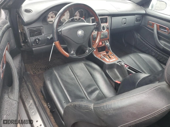 2001 Mercedes-Benz SLK-Class with VIN WDBKK65F01F225700, listed as a Copart auction lot 77999024 with NaN miles and Salvage Title. Bid and sale history available at carsss.com. Image 8.