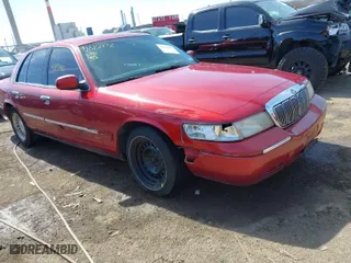 2001 Mercury Grand Marquis GS with VIN 2MEFM74W11X642170, listed as a IAAI auction lot 41815972 with NaN miles. Bid and sale history available at carsss.com. Image 1.