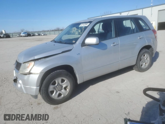 2006 Suzuki Grand Vitara z VIN JS3TE941364101882, wystawiony jako Copart lot #84143364 z przebiegiem 148 560 mil mil oraz Szkody całkowita. Historia ofert i sprzedaży dostępna na DreamBid. Obrazek 1.