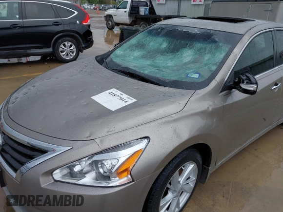 2014 Nissan Altima SV with VIN 1N4AL3AP0EC104072, listed as a IAAI auction lot 41877014 with 173,243 mi miles and . Bid and sale history available at DreamBid. Image 6.