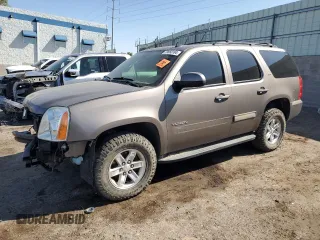 2013 GMC Yukon SLT with VIN 1GKS2CE02DR318091, listed as a Copart auction lot 70860184 with 127,879 mi miles and Salvage Title. Bid and sale history available at carsss.com. Image 1.