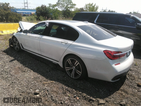 2017 BMW 7 Series 750i with VIN WBA7F0C35HGM21649, listed as a IAAI auction lot 37362691 with 10,000 mi miles and . Bid and sale history available at DreamBid. Image 3.