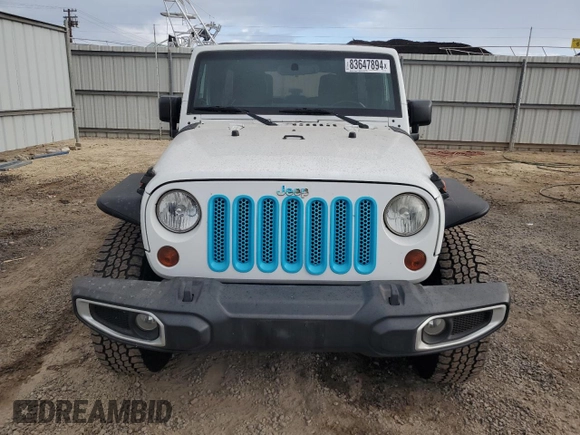 2012 Jeep Wrangler Unlimited Sport z VIN 1C4BJWDG9CL169159, wystawiony jako Copart lot #83647894 z przebiegiem 120 684 mil mil oraz Szkoda całkowita • Salvage title. Historia ofert i sprzedaży dostępna na DreamBid. Obrazek 5.