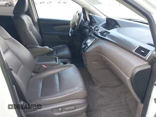 2015 Honda Odyssey Touring Elite with VIN 5FNRL5H9XFB102222, listed as a IAAI auction lot 42485059 with 123,562 mi miles and . Bid and sale history available at DreamBid. Image 5.