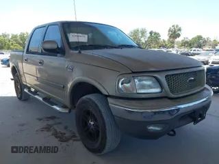 2002 Ford F-150 XLT with VIN 1FTRW08LX2KE43025, listed as a IAAI auction lot 42060641 with 123,507 mi miles. Bid and sale history available at carsss.com. Image 1.